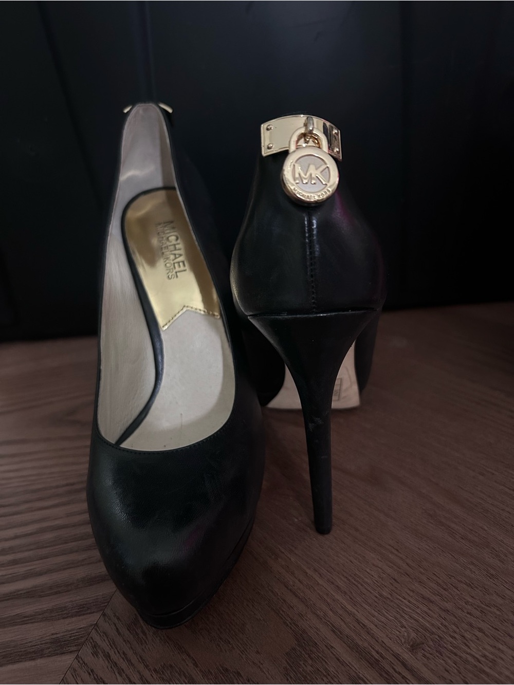 Michael Kors Black Leather Stiletto Pumps with Gold MK Charm